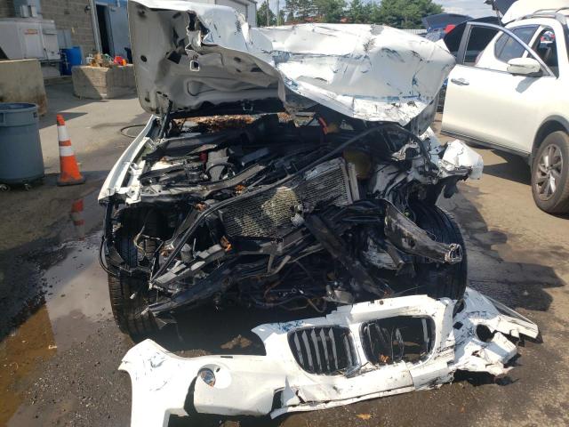 Photo 5 from auction – 2014 BMW X1 XDRIVE2 with VIN WBAVL1C51EVY19309