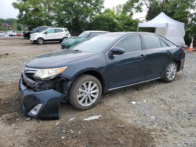 TOYOTA CAMRY HYBR 2012 with VIN 4T1BD1FK5CU028185 - Photo from auction