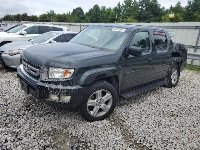HONDA RIDGELINE 2011 with VIN 5FPYK1F5XBB005644 - Photo from auction
