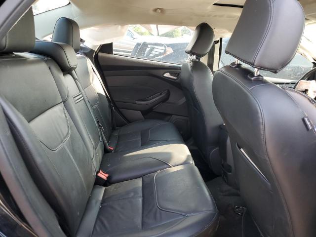 Photo 10 from auction – 2016 FORD FOCUS TITA with VIN 1FADP3J27GL297328