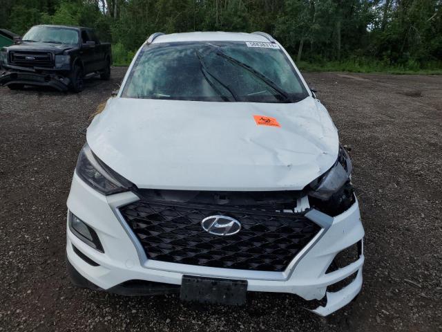 Photo 5 from auction – 2020 HYUNDAI TUCSON LIM with VIN KM8J3CA4XLU245444