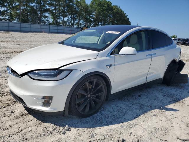 TESLA MODEL X 2017 with VIN 5YJXCAE25HF076669 - Photo from auction