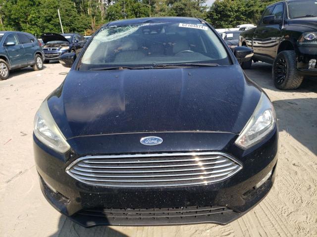 Photo 5 from auction – 2016 FORD FOCUS TITA with VIN 1FADP3J21GL261084