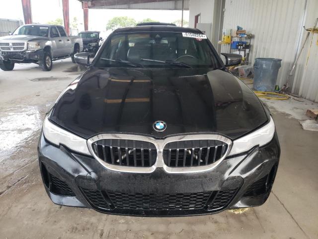 Photo 5 from auction – 2021 BMW 330I with VIN 3MW5R1J00M8B95834