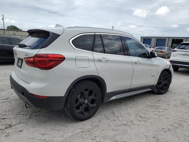 Photo 3 from auction – 2016 BMW X1 XDRIVE2 with VIN WBXHT3C31G5E50986