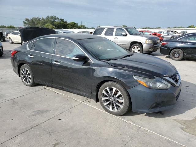 Photo 4 from auction – 2016 NISSAN ALTIMA 2.5 with VIN 1N4AL3AP1GC265811