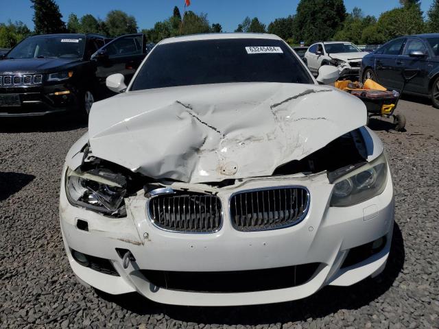 Photo 5 from auction – 2011 BMW 335 I with VIN WBAKG7C52BE263713