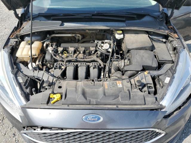 Foto 11 de la subasta – 2018 FORD FOCUS SE con VIN 1FADP3F20JL284646