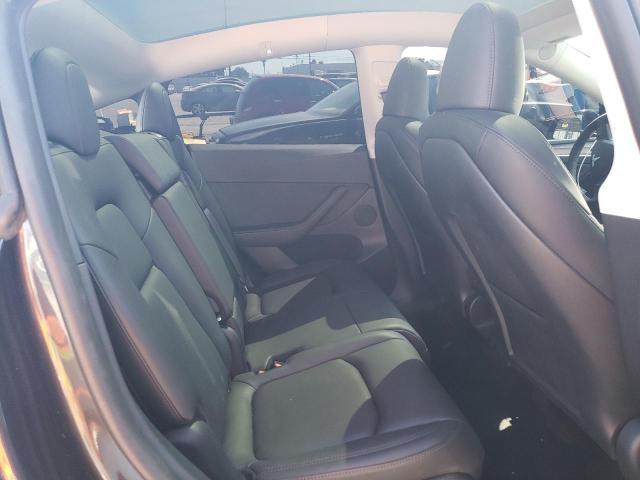 Photo 11 from auction – 2024 TESLA MODEL Y with VIN 7SAYGAEE2RF991177