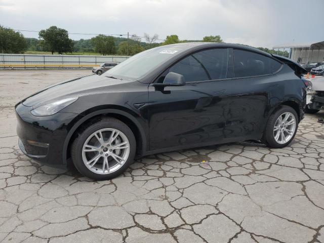 TESLA MODEL Y 2024 with VIN 7SAYGDEE3RA282403 - Photo from auction