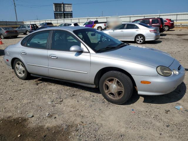 Photo 4 from auction – 1999 FORD TAURUS SE with VIN 1FAFP53U7XA202927