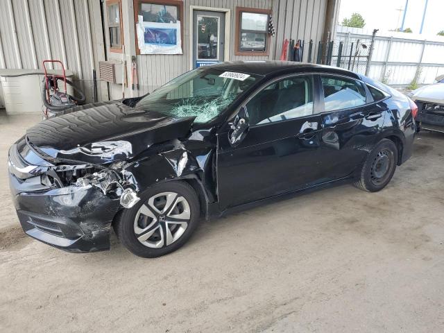 HONDA CIVIC LX 2018 with VIN 19XFC2F50JE010648 - Photo from auction