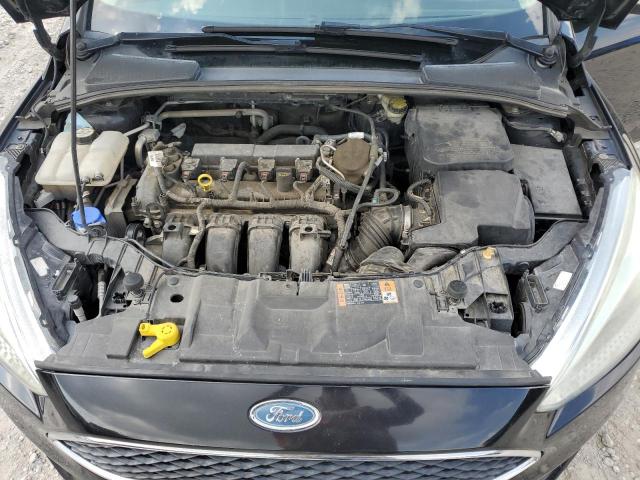 Photo 11 from auction – 2015 FORD FOCUS SE with VIN 1FADP3K24FL221157