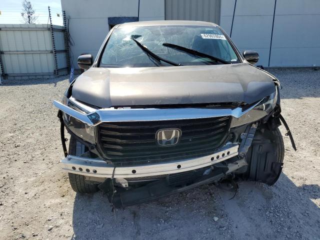 Photo 5 from auction – 2022 HONDA RIDGELINE with VIN 5FPYK3F73NB024361