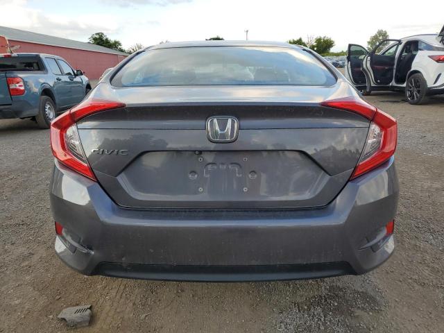Photo 6 from auction – 2018 HONDA CIVIC LX with VIN 2HGFC2E55JH003833