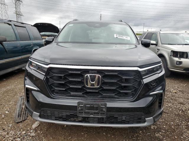 Photo 5 from auction – 2024 HONDA PILOT TOUR with VIN 5FNYG1H77RB023635