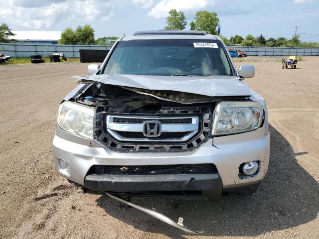 Foto 5 de la subasta – 2011 HONDA PILOT TOUR con VIN 5FNYF4H99BB100579