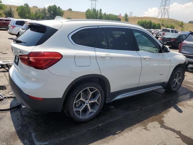 Photo 3 from auction – 2017 BMW X1 XDRIVE2 with VIN WBXHT3Z38H4A58232