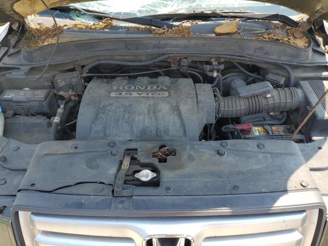 Photo 12 from auction – 2006 HONDA PILOT EX with VIN 2HKYF18626H517506