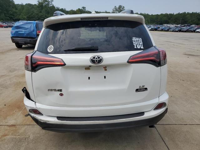 Photo 6 from auction – 2018 TOYOTA RAV4 LE with VIN 2T3ZFREV7JW469663