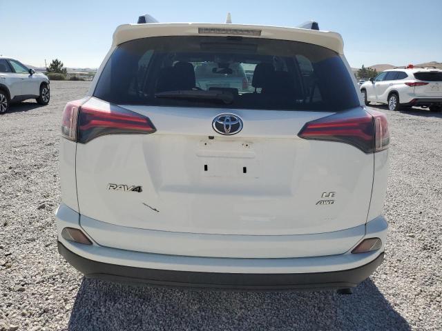Photo 6 from auction – 2017 TOYOTA RAV4 LE with VIN JTMBFREV2HJ113857