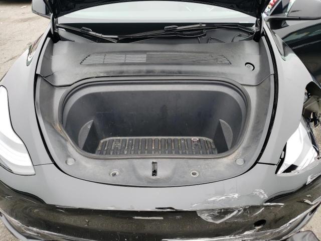 Photo 12 from auction – 2023 TESLA MODEL Y with VIN 7SAYGDEE2PA184024