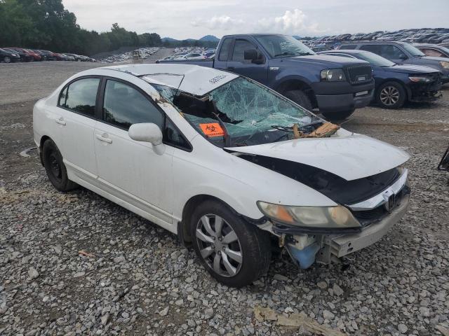 Photo 4 from auction – 2011 HONDA CIVIC LX with VIN 19XFA1F54BE009200