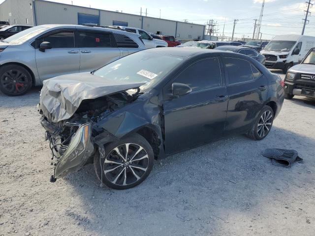 TOYOTA COROLLA L 2017 with VIN 5YFBURHE1HP720328 - Photo from auction