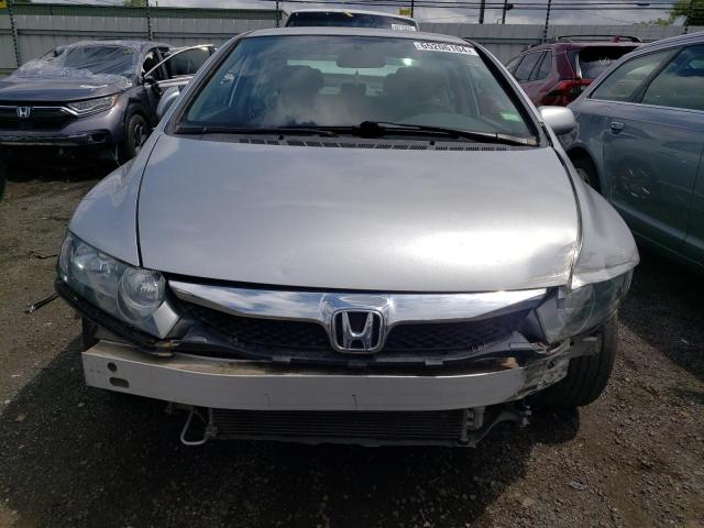 Photo 5 from auction – 2011 HONDA CIVIC LX with VIN 19XFA1F53BE046559