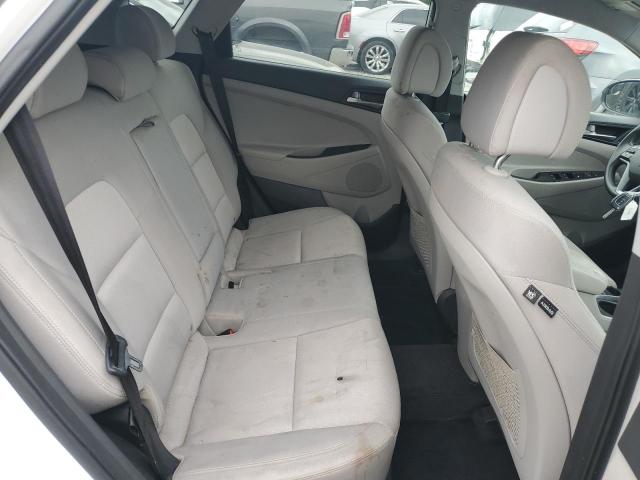 Photo 11 from auction – 2017 HYUNDAI TUCSON SE with VIN KM8J23A45HU584591