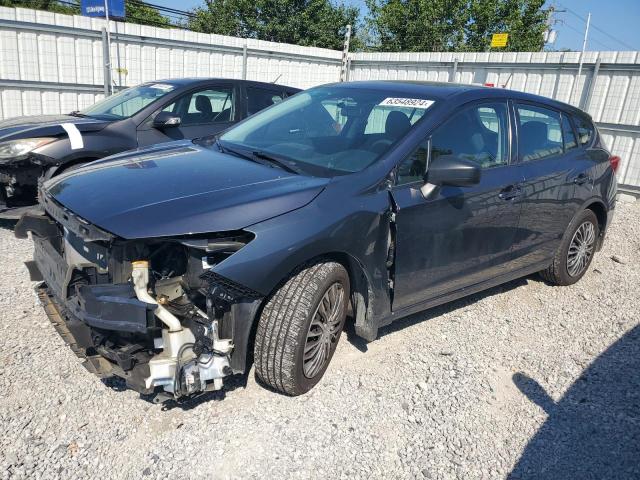 SUBARU IMPREZA 2017 with VIN 4S3GTAA64H3708275 - Photo from auction