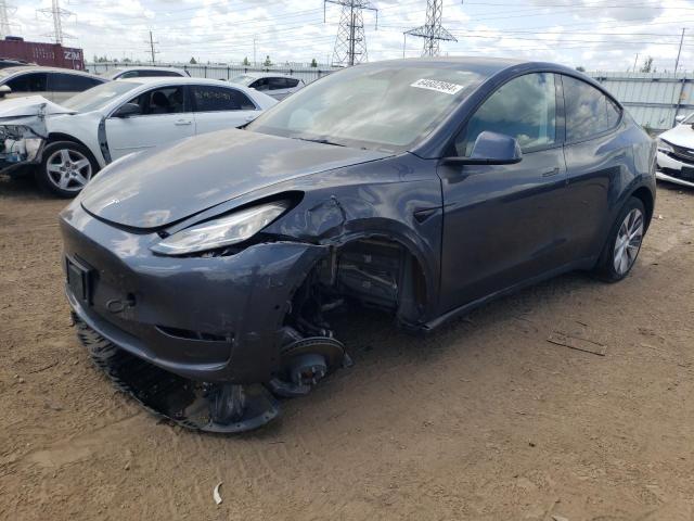 TESLA MODEL Y 2022 with VIN 7SAYGDEE3NA007737 - Photo from auction