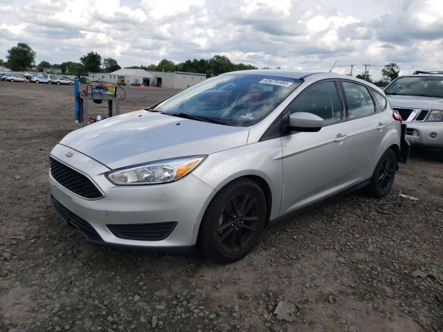 FORD FOCUS SE 2018 with VIN 1FADP3K21JL272284 - Photo from auction