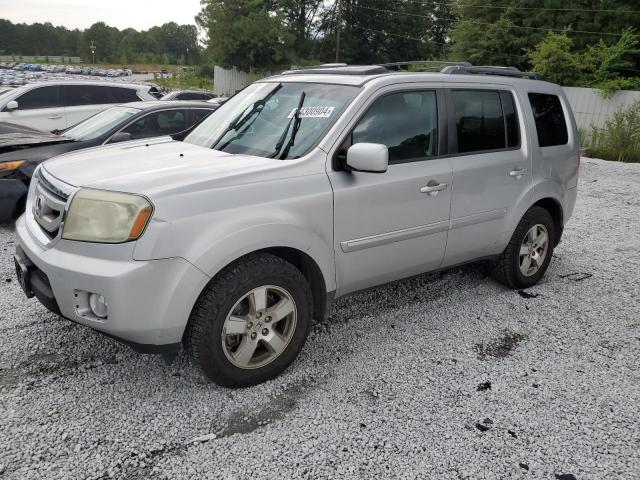 HONDA PILOT EXL 2011 with VIN 5FNYF3H59BB022828 - Photo from auction