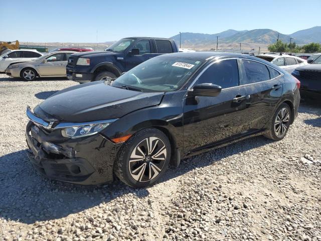 HONDA CIVIC EX 2018 with VIN JHMFC1F30JX015596 - Photo from auction