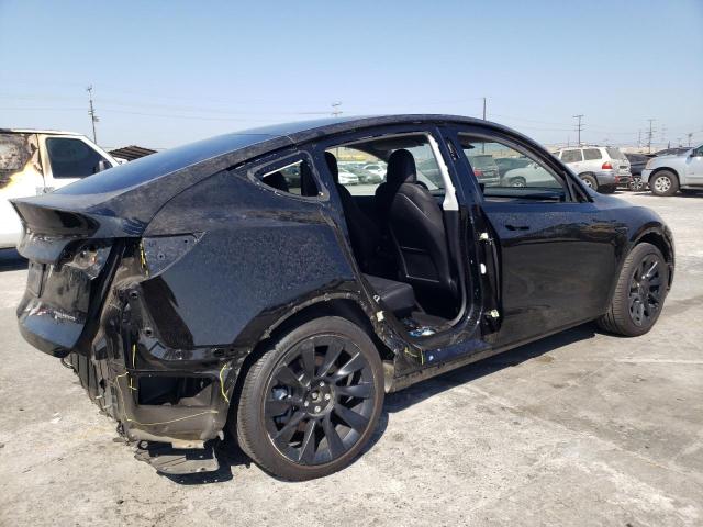 Photo 3 from auction – 2021 TESLA MODEL Y with VIN 5YJYGDEE9MF286853