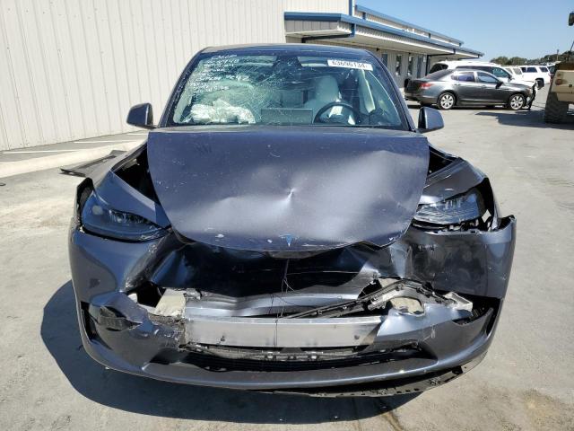 Photo 5 from auction – 2023 TESLA MODEL Y with VIN 7SAYGDEE9PF883928
