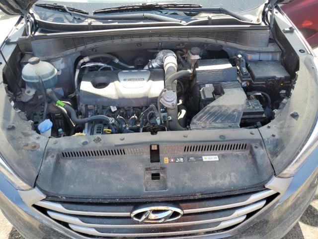 Photo 11 from auction – 2018 HYUNDAI TUCSON VAL with VIN KM8J3CA25JU670615