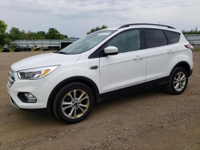 FORD ESCAPE SE 2018 with VIN 1FMCU0GDXJUC50037 - Photo from auction