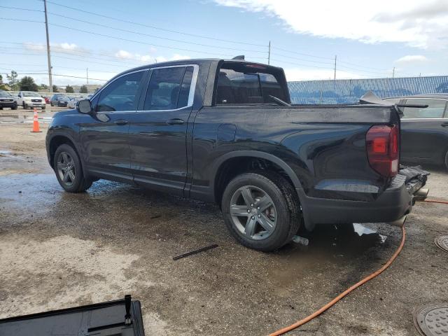 Photo 2 from auction – 2023 HONDA RIDGELINE with VIN 5FPYK3F52PB027723