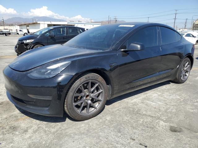 TESLA MODEL 3 2021 with VIN 5YJ3E1EAXMF069467 - Photo from auction
