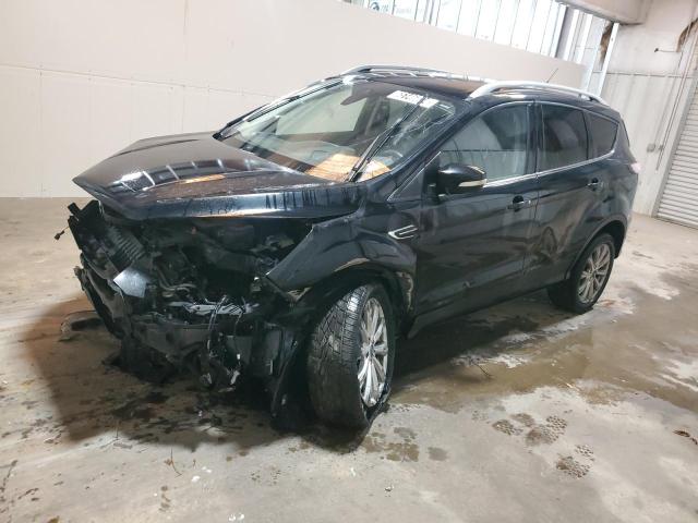 FORD ESCAPE TIT 2017 with VIN 1FMCU0JDXHUB43234 - Photo from auction