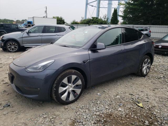 TESLA MODEL Y 2023 with VIN 7SAYGDEE8PF878042 - Photo from auction