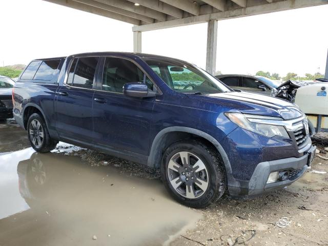Photo 4 from auction – 2017 HONDA RIDGELINE with VIN 5FPYK2F51HB005210