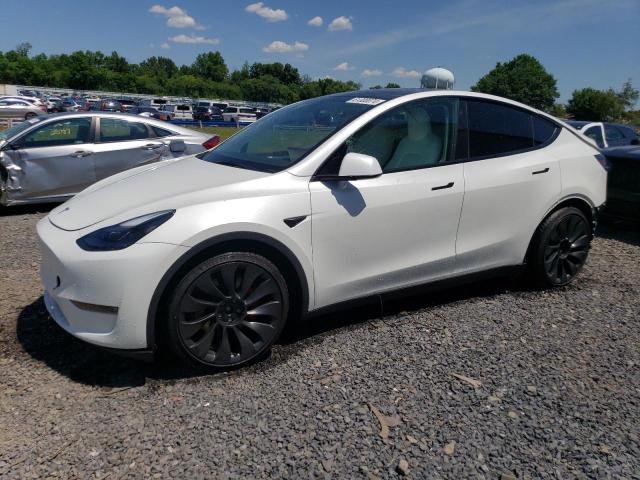 TESLA MODEL Y 2023 with VIN 7SAYGDEF4PF665341 - Photo from auction