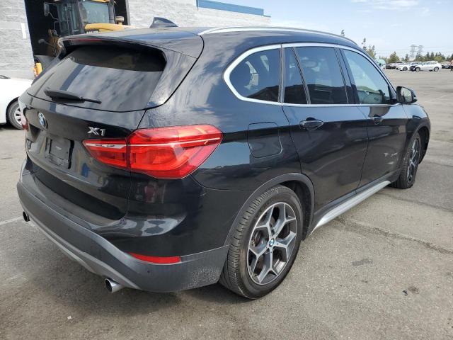 Photo 3 from auction – 2017 BMW X1 XDRIVE2 with VIN WBXHT3C34H5F69133