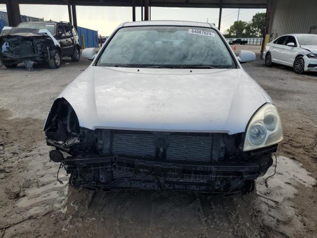 Photo 5 from auction – 2006 KIA OPTIMA LX with VIN KNAGE123265033653