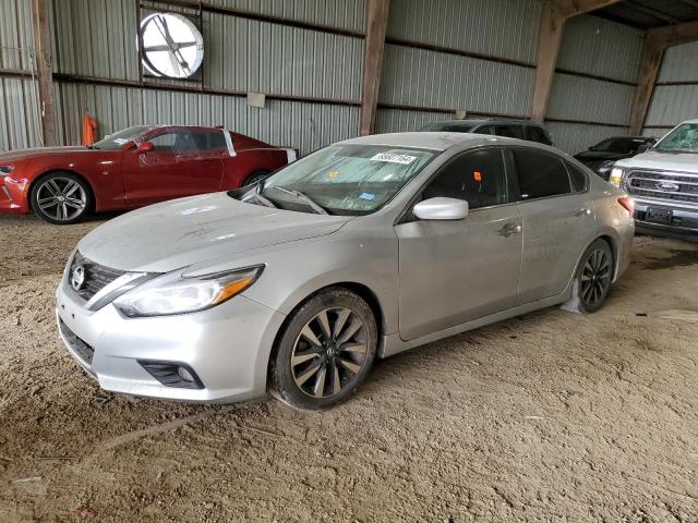 NISSAN ALTIMA 2.5 2018 with VIN 1N4AL3AP1JC210878 - Photo from auction