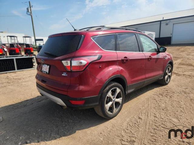 Photo 3 from auction – 2017 FORD ESCAPE SE with VIN 1FMCU9GD1HUD46010