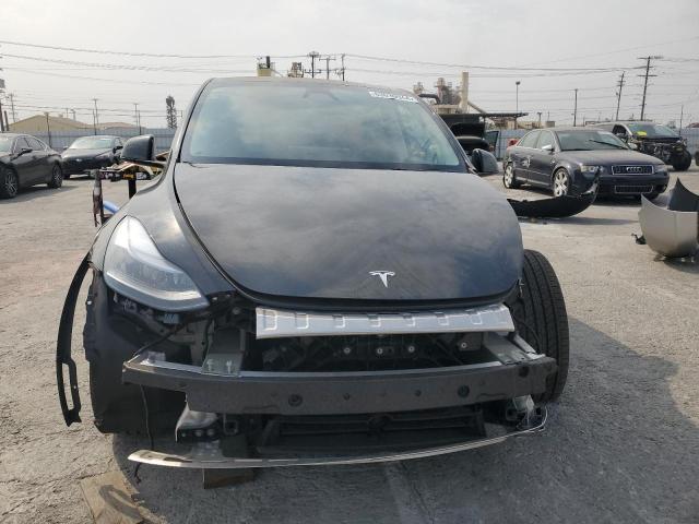 Снимка 5 от търг – 2023 TESLA MODEL Y с VIN 7SAYGAEE5PF894603